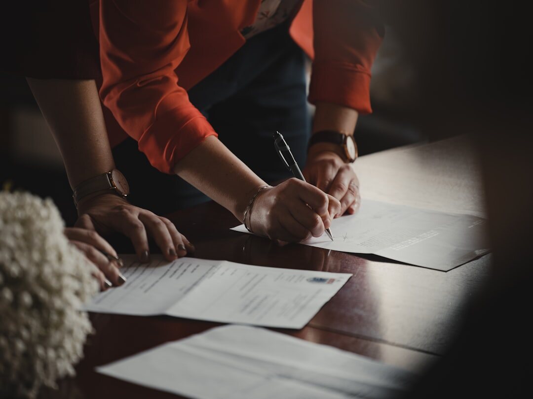 person reviewing insurance papers