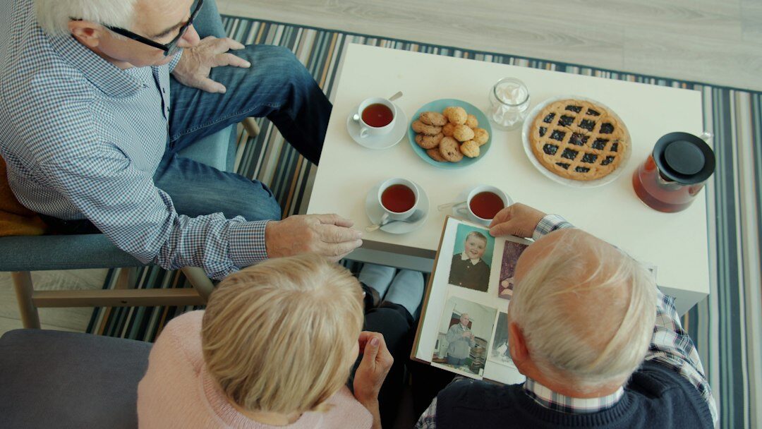 family reviewing insurance papers at home